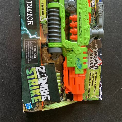 nerf zombie strike|NERF Revoltinator Zombie Strike Toy Blaster with Motorized Lights.